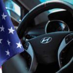 volante Hyundai e la bandiera degli USA